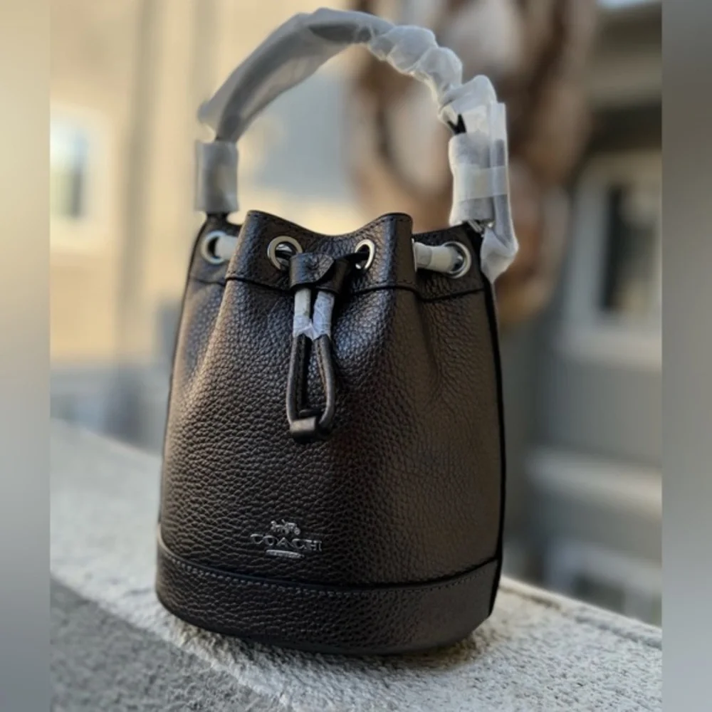 NWT COACH DEMPSEY DRAWSTRING BUCKET BAG 15 IN SILVER/METALLIC GUNMETAL CROSSBODY